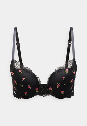 Μαύρο σουτιέν με κεντήματα λουλουδιών σε ροζ και πράσινο. Διαθέτει δαντελένια διακόσμηση και ρυθμιζόμενους ιμάντες, προσφέροντας δομημένο σχήμα και σχέδιο.