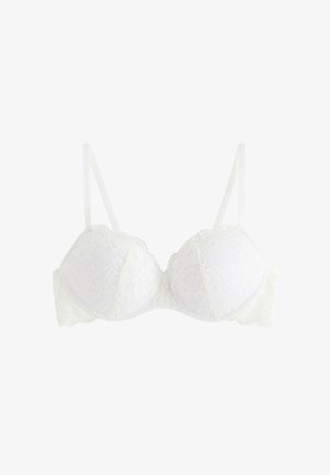 Reggiseno bianco in pizzo con motivi floreali, coppe con ferretto, spalline regolabili e bordi ondulati.
