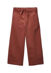 Pantalons larges de couleur rouille avec taille élastique et cordon de serrage, dotés de poches latérales et de coutures visibles.