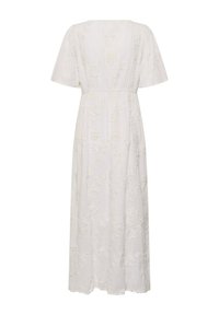 Robe blanche longueur cheville avec manches courtes et broderie florale subtile, dotée d'une taille cintrée et d'une coupe ample.
