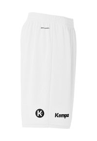 Witte sportshorts van lichtgewicht stof met een elastische tailleband. Bevat een zwart 'Kempa' logo en de '2LDC drytech' opdruk nabij de tailleband.