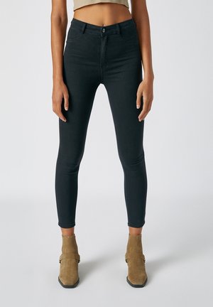 Vaqueros pitillo - mottled black