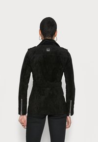 Freaky Nation Casaco de couro - black
