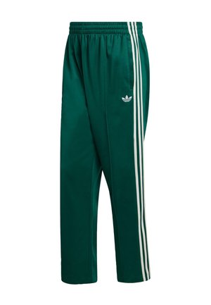 Green athletic pants made of smooth fabric with an elastic waistband, featuring three white stripes along the sides and an embroidered logo.