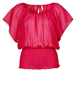 Jasnoróżowa przezroczysta bluzka z małymi białymi groszkami, szerokimi rękawami typu nietoperz, elastyczną talią i zapięciem na guzik z otworem przy dekolcie.