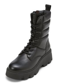 Schwarze Leder-Ankle-Boots mit dicker Sohle, Schnürung an der Vorderseite und gepolsterten oberen Teilen. Mit einer Ziehschlaufe auf der Rückseite für ein einfaches Anziehen.