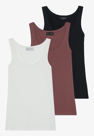 Three tank tops in white, burgundy, and black. Each features a scoop neckline and thin straps, made of soft, stretchy fabric.
