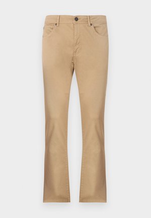 Beige katoenen broek met recht uitlopende pijpen, voorzien van voorzakken, een ritssluiting en een knoopsluiting. Gladde afwerking en een egale kleur.