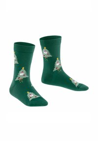 Grüne Baumwollsocken mit einem verspielten Weihnachtsbaum-Muster, das einen Stern und Ornamenten zeigt. Rippbündchen und eine glatte Textur.