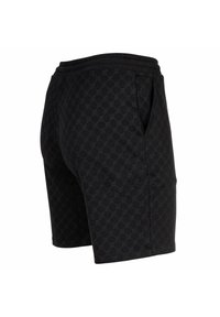 Mustat shortsit, joissa on hienovarainen timanttikuvio, joustava vyötärö ja sivutaskut, näkyvät kolmannesta neljänneksestä takaa.