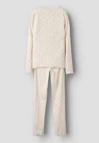 Kremowy komplet z długim rękawem i spodniami z prążkowanej tkaniny w mały różowy kwiatowy wzór oraz z falbankami, zaprezentowany z tyłu na jasnym tle.