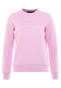 Růžová mikina vyrobená z měkké tkaniny s kulatým výstřihem a dlouhými rukávy typu raglán. Na přední straně má embosovaný nápis "PEAK PERFORMANCE ORIGINAL".