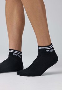SNOCKS UNISEX czarny
