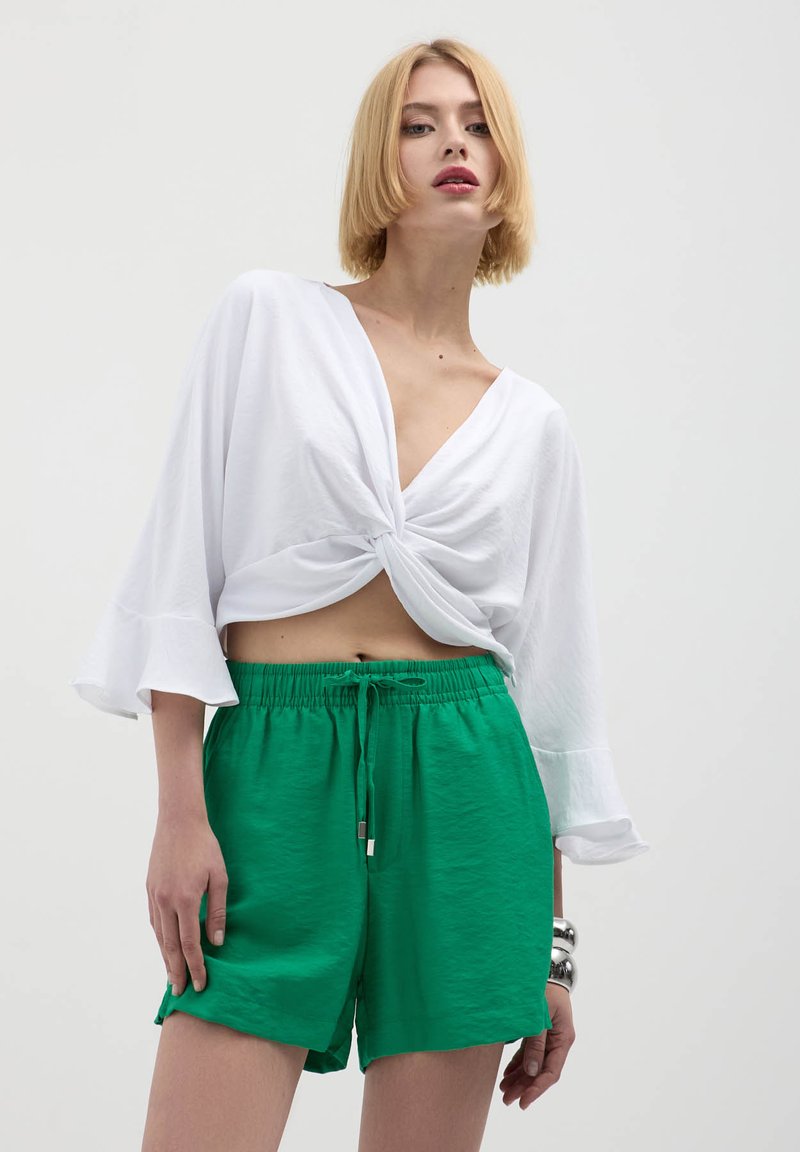Calliope Pantaloni sportivi - verde