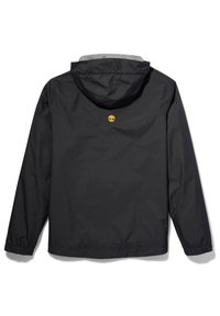 Veste à capuche noire avec des poignets élastiques et un petit logo d'arbre jaune centré sous la capuche à l'arrière.