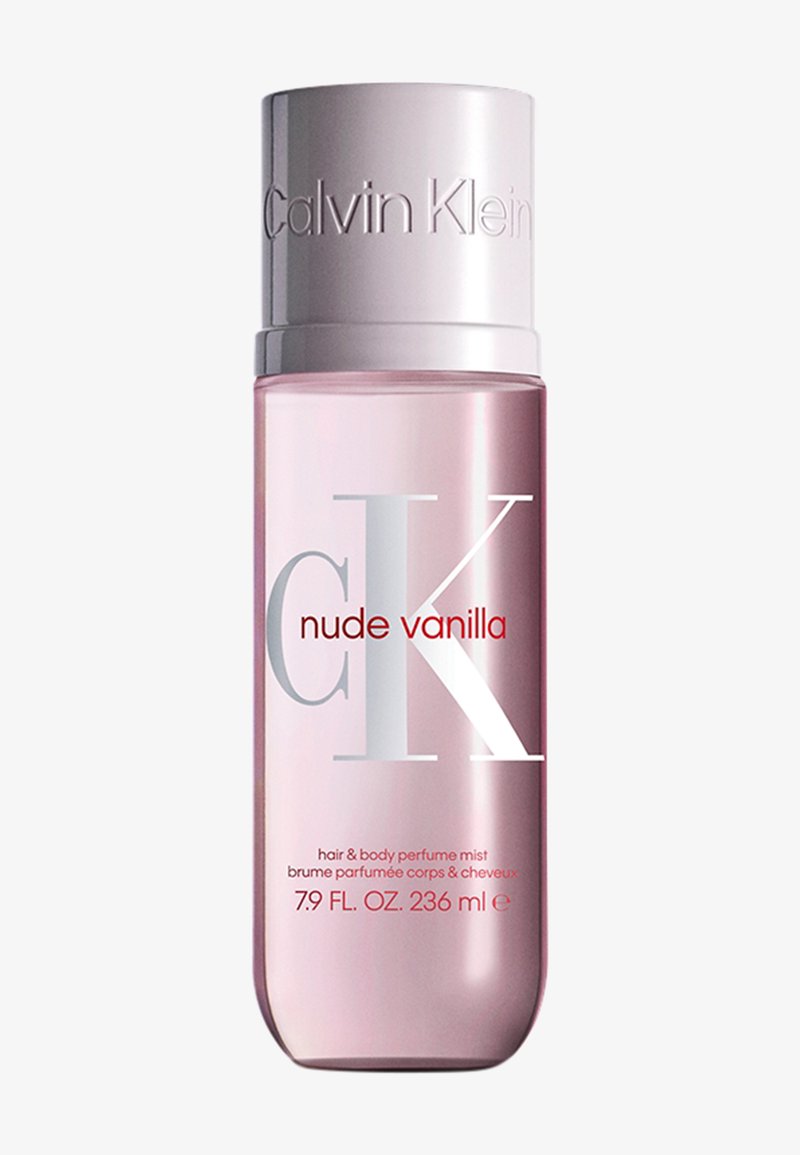 Clear cylindrical bottle with pink-tinted liquid, silver cap, and white “CK” logo. Label reads “nude vanilla” in red. 236 ml size.