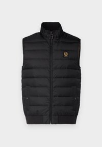 Black padded vest with a high collar, front zipper, two pockets, and a logo patch. Features a smooth outer texture and quilted pattern.