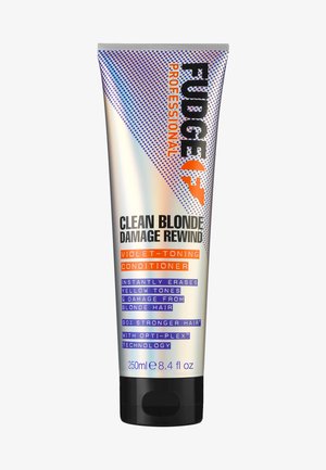 Fudge Clean Blonde Damage Rewind balsam i en metallrør. Nøkkelfunksjoner: violet-toning, 250ml, svart hette, iøynefallende tekst med levende farger.