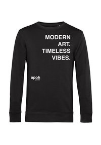 Felpa nera con maniche lunghe, con testo bianco: "ARTE MODERNA. VIBRAZIONI TIMIDE." e un piccolo logo nell'angolo inferiore. Materiale morbido.
