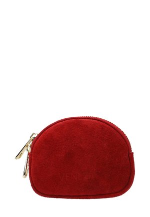Red suede pouch with a gold zipper and hardware, rounded shape, embossed logo, and soft texture. Suitable for small essentials.