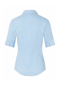 Light blue, short-sleeved shirt with a collared neckline, featuring a fitted design and subtle side seam detailing. Smooth fabric texture.
