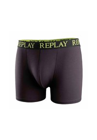 Boxers negros hechos de un material elástico, con una cinturilla ancha de logo REPLAY en verde y negro. Textura suave y diseño ajustado.
