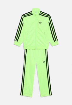 adidas Originals FIREBIRD UNISEX - Teplákové kalhoty - signal green