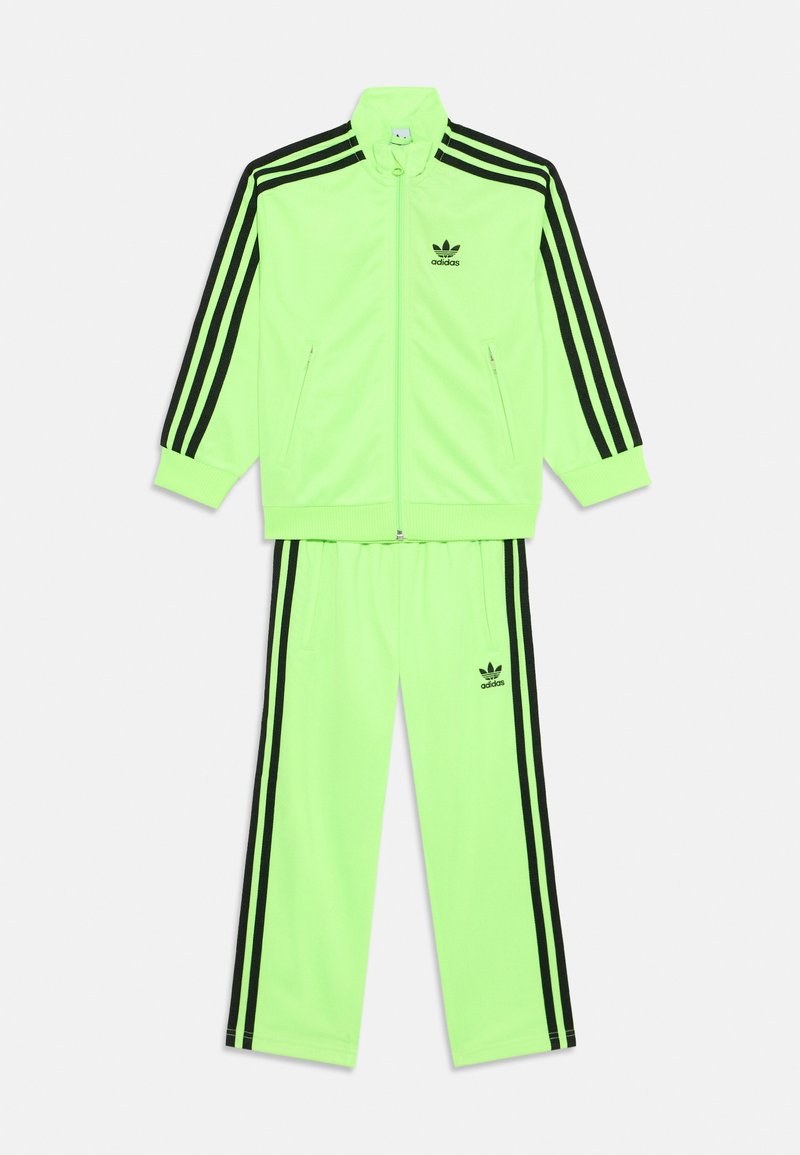 adidas Originals FIREBIRD UNISEX - Verryttelyhousut - signal green