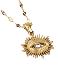 Gold pendant shaped like an eye with rays, featuring a central clear gemstone. Attached to an ornate gold chain.
