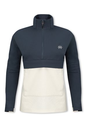 Pullover navy e crema con colletto alto, zip anteriore a metà e texture a griglia nella parte inferiore. Logo piccolo sul petto.
