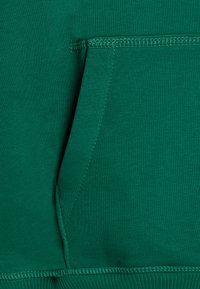 The North Face TEEN ESSENTIAL OVERSIZED HOODIE UNISEX - Sportska majica - evergreen