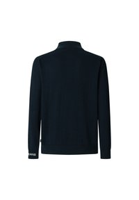 Pull-over bleu marine foncé avec un col à revers, des manches longues, des poignets côtelés et un détail de logo sur la manche. Texture de tissu lisse.