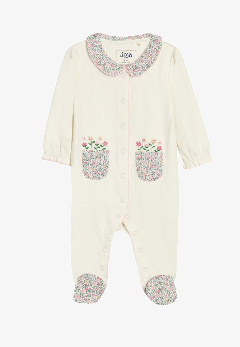 Kreemikas beebikombinesoon roosa ja rohelise lillelise kraega, sobivate lilleliste taskutega, millel on tikitud lilled, ning lillelised jalakatted, eest klõpsnappidega.