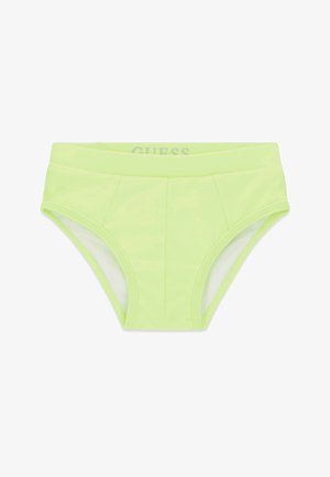 Slip de bain homme vert clair avec une large ceinture et une couture visible à l'avant, marqué GUESS à l'intérieur de la ceinture.