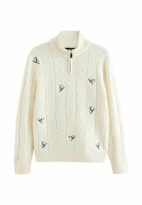 Balta adīta džemperis ar augstu apkakli, kas aprīkots ar priekšējo rāvējslēdzēju un ziemas sporta tematiskajiem izšuvumiem dažādās krāsās visā virsmā.