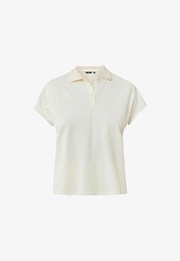 Polo de manga corta en algodón color blanco roto con bordado floral tonal en el lado izquierdo, que cuenta con un cuello clásico y una tapeta de tres botones.