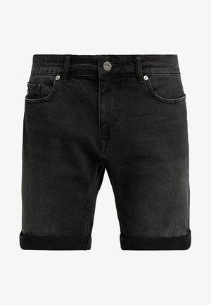 Mustat denimmekot, joissa on rento istuvuus, käännetyt lahkeet, viiden taskun muotoilu ja metallinen nappisuljenta vyötäröllä.