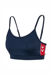 Brassière de sport bleu marine avec fines bretelles, design sans coutures et accent multicolore ; présente un panneau latéral rouge avec un motif chevron blanc.