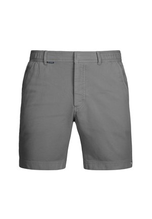 Shorts gris en tissu tissé avec une taille élastique, une finition plate à l’avant, des poches latérales et un petit logo sur la ceinture.
