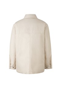 Beżowa pikowana kurtka z kołnierzem, długimi rękawami zakończonymi na guziki oraz gładką, lekko błyszczącą teksturą.