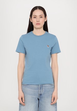 Blå bomulls t-skjorte med rund hals og kortermet, med et lite brodert sebra-design på venstre bryst.