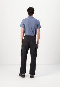 Tommy Jeans OTIS HERRINGBONE PANTS - Cargobroek - black