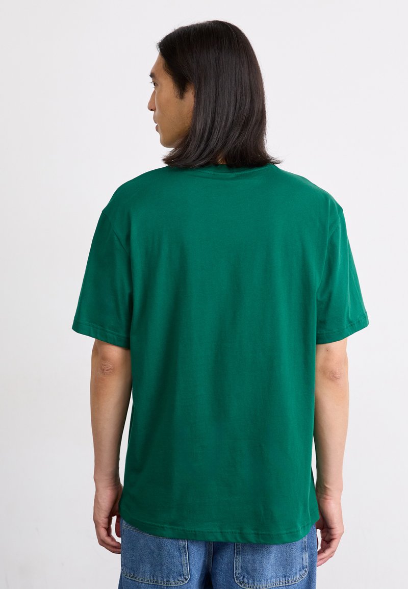 adidas Originals GRAPHIC TEE - Triko s potiskem - collegiate green