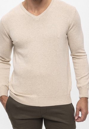 Stickad tröja - beige