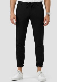 Zuitable - DISPARTAKUS - Trousers - black Thumbnail Image 1