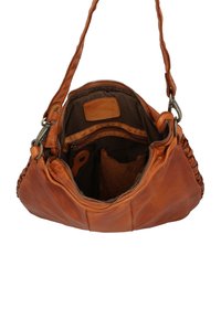 Brown leather shoulder bag with main zipper open, showing inner zip pocket, smaller compartments, and adjustable strap with metal hooks.
