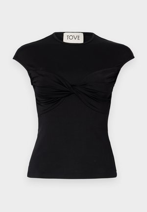 Top preto de manga curta com detalhe torcido à frente e silhueta ajustada. Feito de um tecido elástico e suave. Marca: TOVE.