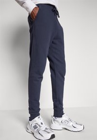 AllSaints RAVEN PANT - Pantalones deportivos - cadet blue