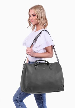 Graue Kunstleder-Handtasche mit Doppelgriffen und abnehmbarem Schultergurt. Runde Form, einfache Beschläge und glatte Textur.