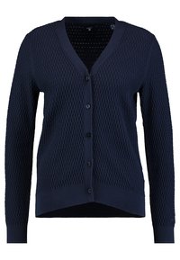 Cárdigan de punto azul marino con un patrón de diamante texturizado, cuello en V, mangas largas y botones en el frente. Dobladillos y puños acanalados.